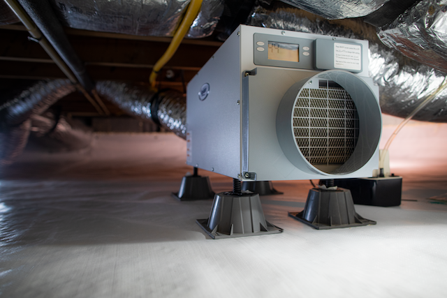 Crawl Space Dehumidifier Installation Mineral Area Waterproofing Mineral Area Waterproofing Crawl space dehumidifier installed on a sealed vapor barrier by Mineral Area Waterproofing